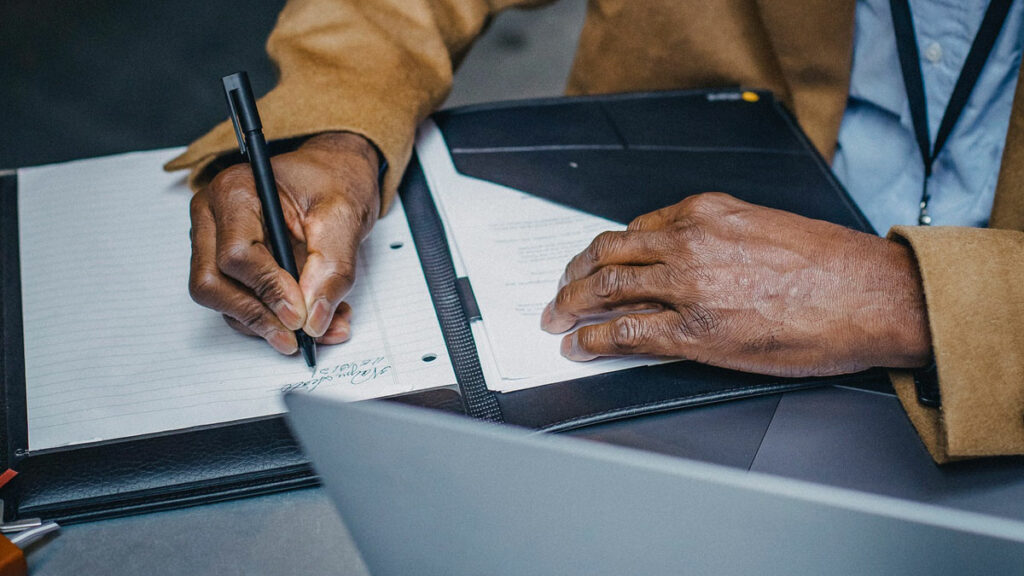 featured image of man's hands for altura workday learning blog post