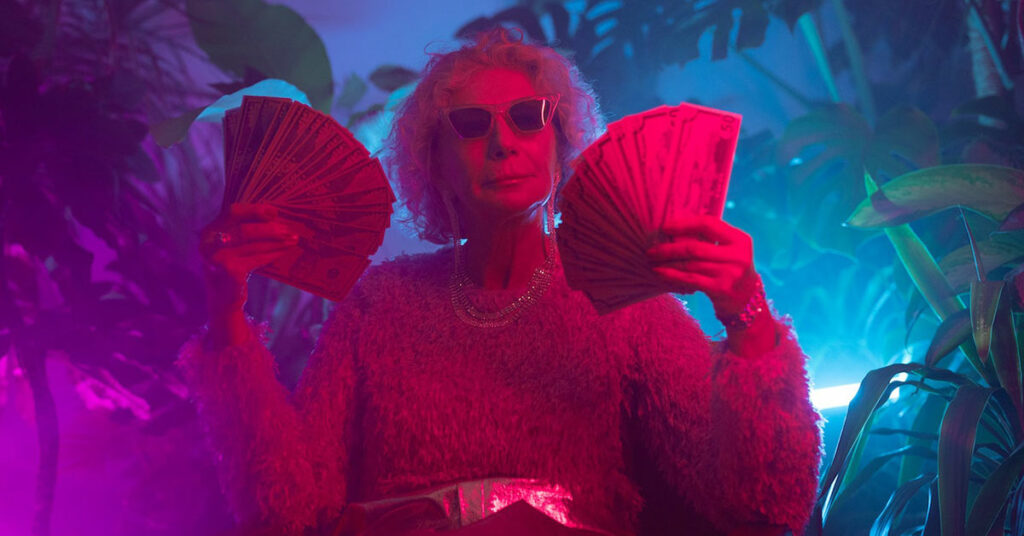 woman holding money to represent self-service for one-time payment in workday